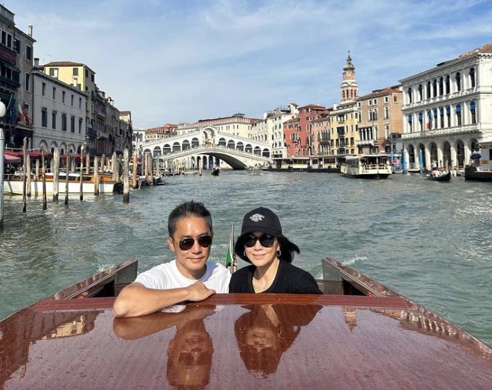 捲烏龍緋聞後...梁朝偉淚獲威尼斯影展終身成就獎 劉嘉玲甜喊回家