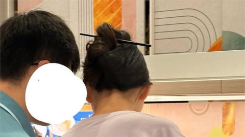 情侶吃壽司拿內用筷當髮簪引熱議 業者:保留法律追究權