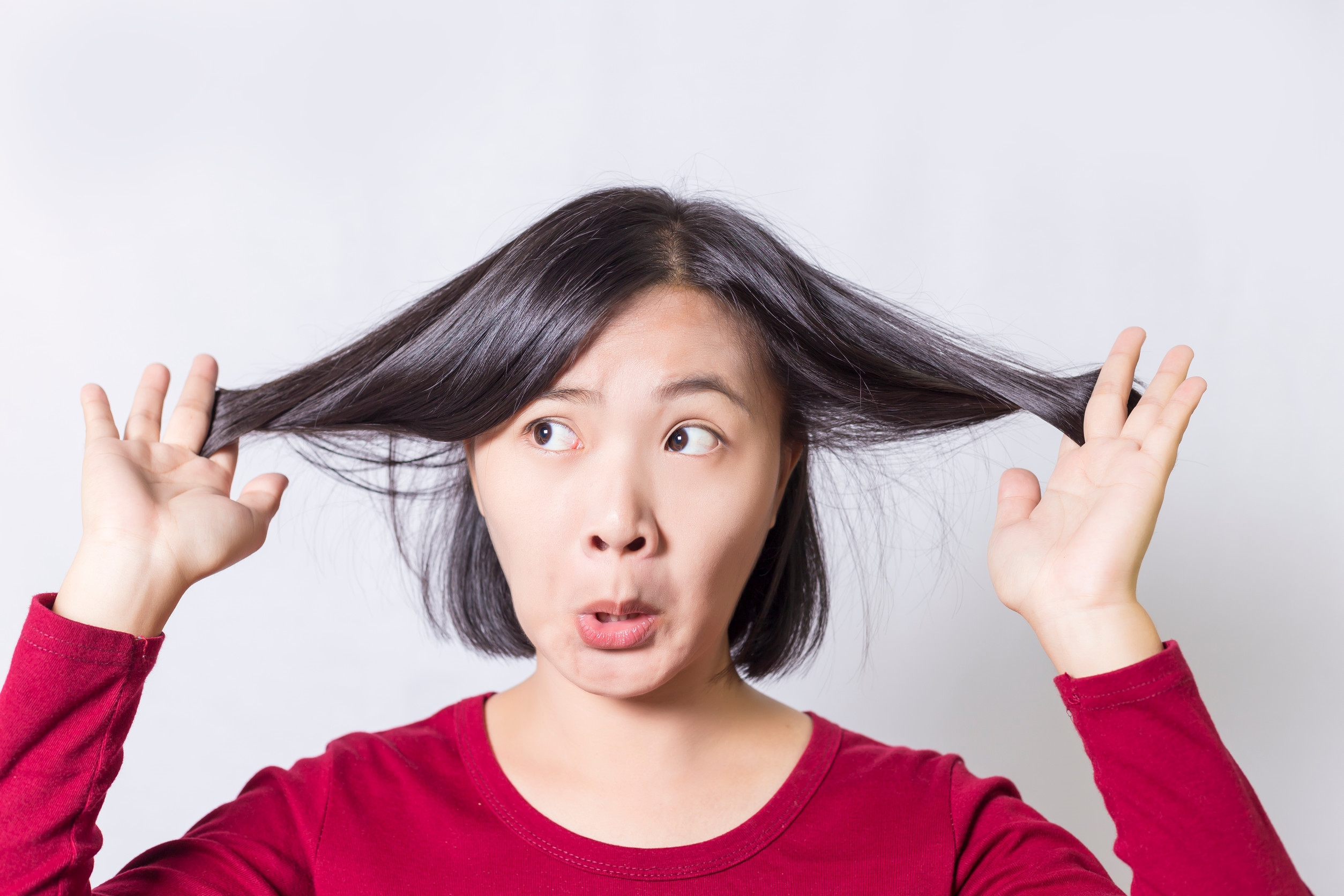 冬天頭髮之所以特別容易產生靜電，脫帽時髮絲散亂，關鍵在於空氣濕度。圖/123RF圖庫