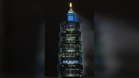 Alex Honnold明登場！民眾尾牙驚喜目擊徒手攀爬　101打燈加油