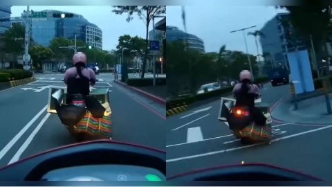 機車載羊奶「後座掛滿貨遮車牌」 後方騎士傻眼:根本無敵星星