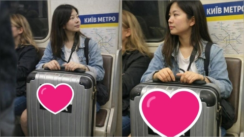 正妹搭地鐵「行李箱」意外成焦點！超狂標語「台灣不是中國」紅到日本