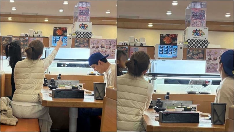 為了逗女兒開心,許維恩、王家梁很認真在研究餐廳的扭蛋活動。(圖/讀者提供)