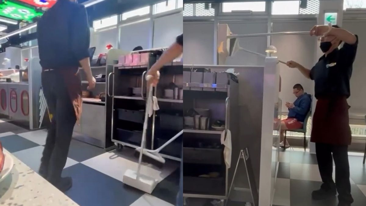 圖／影片可見掃把與畚斗直接在用餐區操作，部分垃圾也暫放在座位旁。（翻攝 Threads）