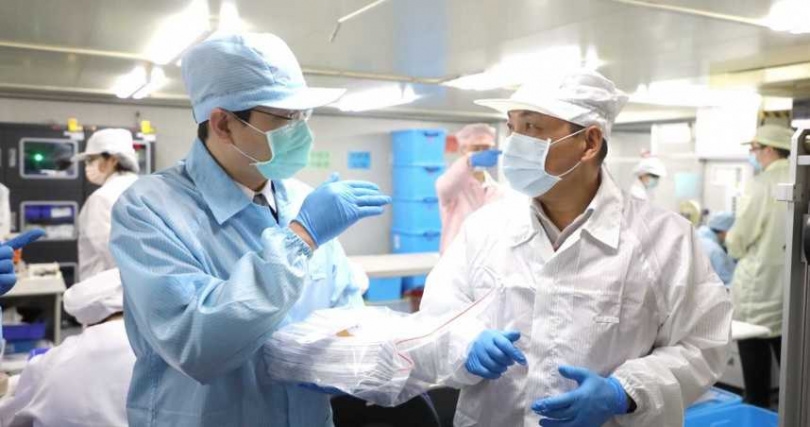 新北市長侯友宜視察過的泰博公司，傳出與移工的勞資糾紛，並與工會對抗中。（圖／報系資料照）