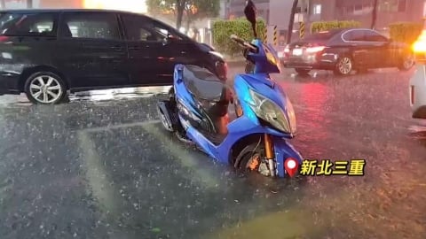 雨彈狂炸北台灣！馬路淹成小河　新店2男一度困沙洲