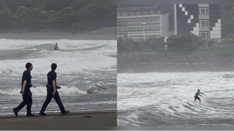 颱風假跑西子灣衝浪!警急勸離免罰掀論戰 網友怒喊拿命開玩笑