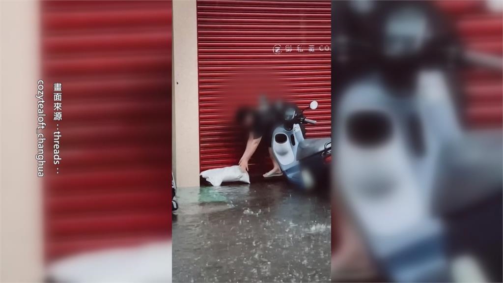 暖心!彰化店家公休不在 鄰居幫堆沙包防淹